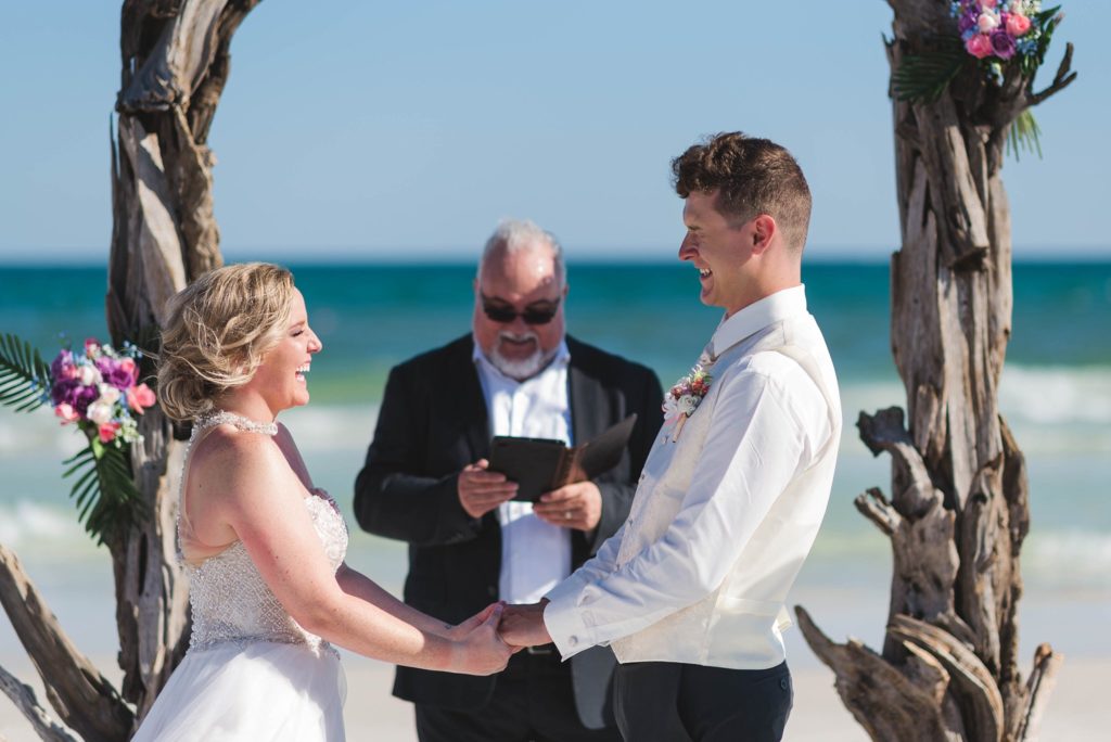 Bride and groom at island wedding on beach